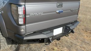 Ford Raptor Rear Bumper - Addictive Desert Designs - HoneyBadger with Integrated Storage Box and Backup Sensor Cutouts - Hammer Black with Satin Black panels - `10-`14 Ford Raptor Rear Bumper - Addictive Desert Designs - HoneyBadger with Integrated Storage Box and Backup Sensor Cutouts - Hammer Black with Satin Black panels - `10-`14
